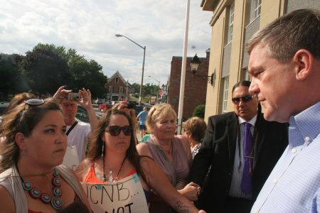 Grassroots women address New Brunswick Premier David Alward as part of anti-fracking actions. Photo by Miles Howe